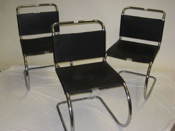 Sette poltroncine produzione Knoll in metallo e cuoio