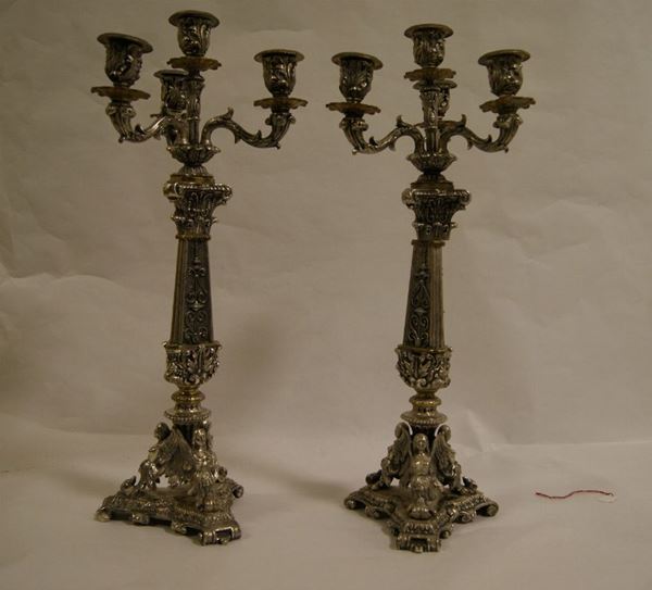 Coppia di candelieri , sec.XX, in metallo argentato, alt.cm  53