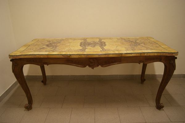 Tavolo rettangolare, con base in legno intagliato, piano in marmo broccatello di Siena, cm 190x89x80