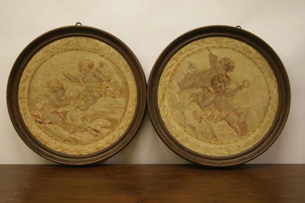 Due tondi Aubusson, sec. XIX, raffiguranti PUTTI, diam. cm 60