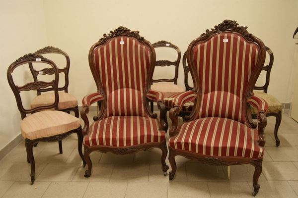 Coppia di poltrone, Luigi Filippo sec. XIX, in legno intagliato e sagomato, ricoperte in stoffa a righe e nove sedie analoghe, sec. XIX, difetti