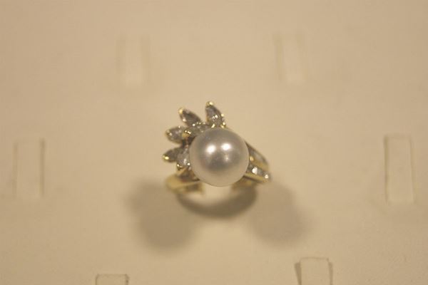 Anello oro bianco con perla e brillanti