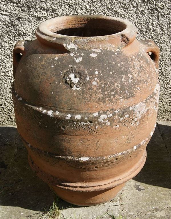 Orcio, sec. XIX, in terracotta Impruneta, a due manici con rosone, mancanze e difetti, cm 95x66