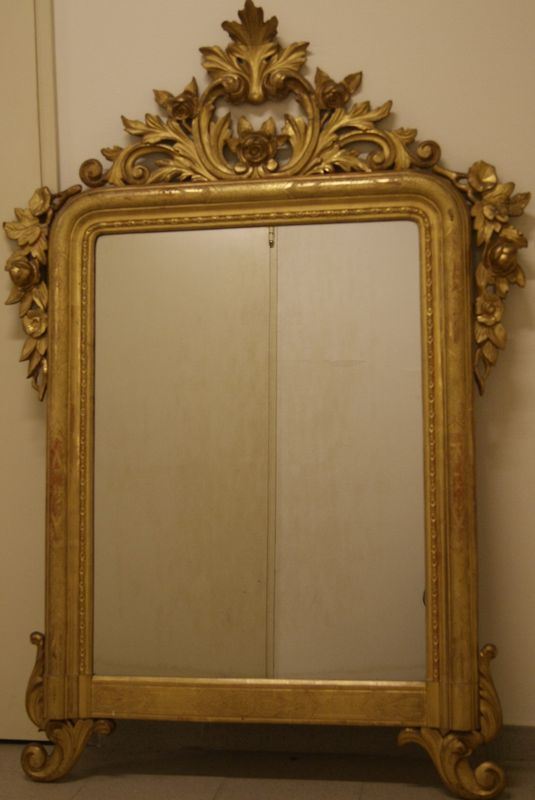 Specchiera, Francia sec. XIX, in cornice legno intagliato e dorato, cm 170x115
