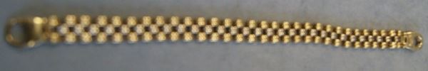 Bracciale, in oro giallo e bianco a maglie snodate gr. 33,6