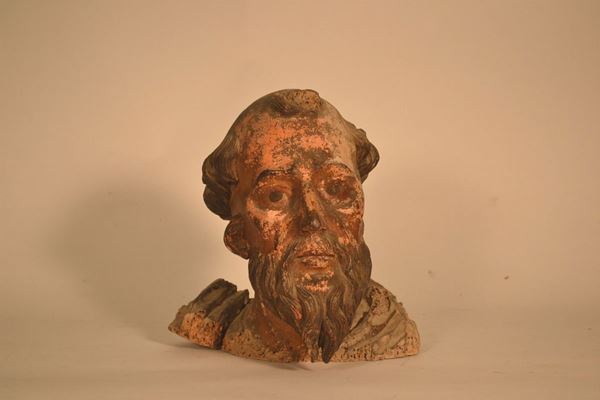 Scuola Italia settentrionale, sec. XVII TESTA DI SANTO scultura lignea con policromia in parte perduta, alt. cm 26, frammento