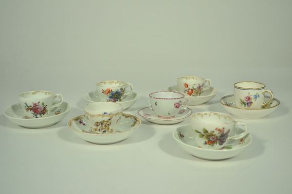 Gruppo di sette tazze da caffÃ¨ con piattini, in porcellana dipinta in  policromia composto di: quattro tazzine con piattini, Vienna, fine sec. XVIII, piattini non pertinenti;  una tazza con piattino, Vienna fine sec. XVIII, con decoro a monogrammi dorati;  una tazza con piattino, Svres, seconda metÃ  sec. XVIII, con decoro a fiori;  una tazza con piattino, manifattura di Doccia, inizio sec. XIX, con decoro a roselline, danni (14)