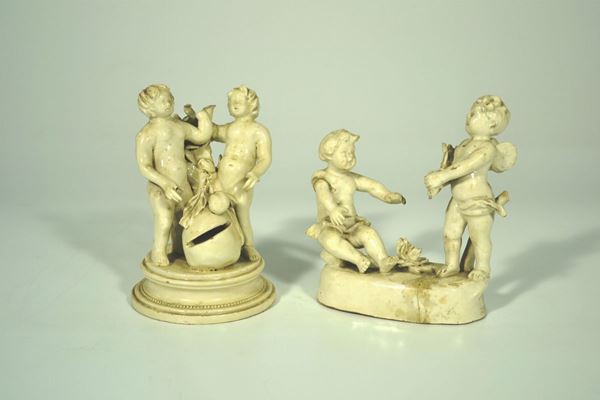 Due gruppi, inizio sec. XIX, in maiolica bianca delle Nove di Bassano,  raffiguranti uno due putti alati che accendono il fuoco, alt. cm 16, e l' altro due fanciulli nudi alla base di un albero, alt. cm 16,5, danni (2)