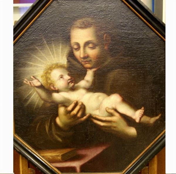 Scuola italiana, sec. XVIII  SANTO CON BAMBINO  olio su tela ottagonale, cm 74x65