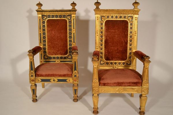 Coppia di troni in legno intagliato e dorato,  Roma sec. XIX,  cartelle, sedile e parte dei braccioli imbottiti e rivestiti in velluto rosso  - Asta Arredi, oggetti d'arte, mobili antichi e argenti - Poggio Bracciolini Casa d'Aste