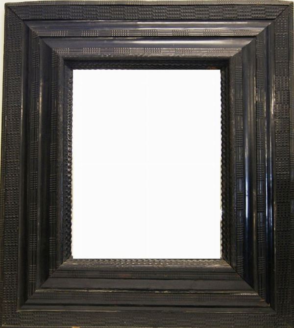 Specchiera, sec. XVIII, in cornice lignea guilloche, cm 88x100, specchio d'epoca posteriore