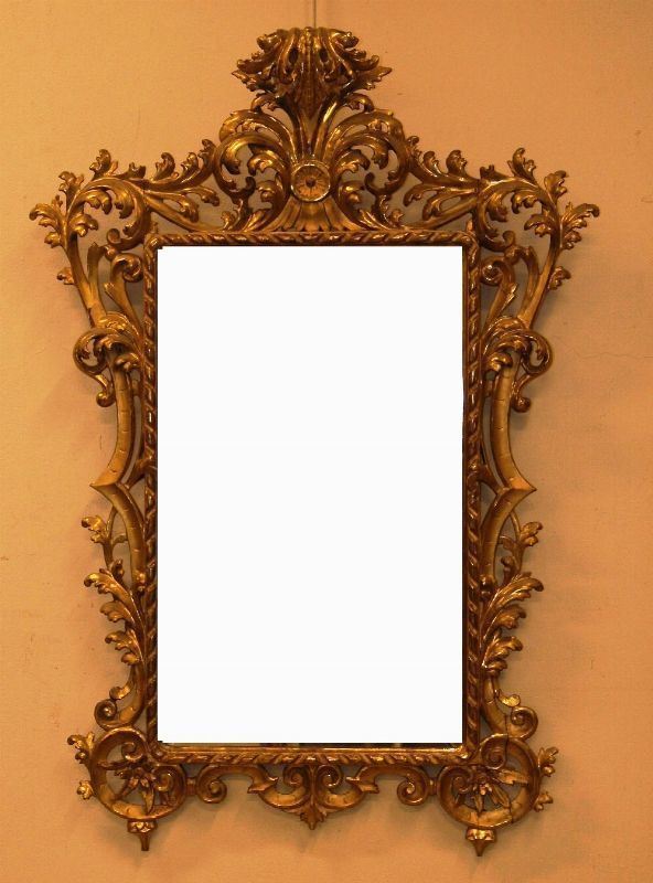 Specchiera, Toscana, sec. XIX, in legno intagliato a scartocci e dorato, cm 77x125, specchio d'epoca posteriore