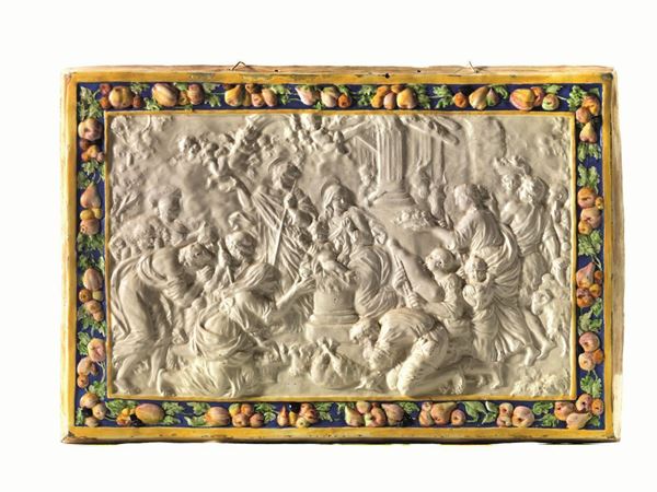 Placca, manifattura di Capodimonte, sec. XIX, in maiolica bianca  raffigurante La NativitÃ , cornice realizzata da festoni di frutti in  policromia 59x39, piccoli restauri e alcune sbocconcellature