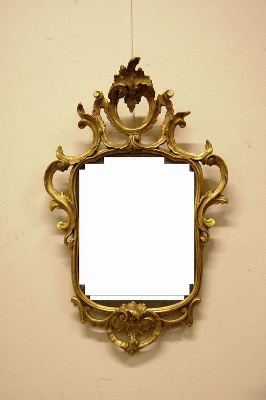Specchiera, sec. XIX, con cornice in legno intagliato e dorato, cm 80x50, restauri