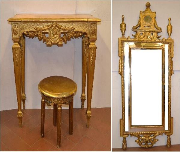 Piccola console in stile Luigi XVI in legno intagliato e dorato, piano a    finto marmo, gambe troncopiramidali, cm 84x40x87, completa di specchiera    con cornice in legno intagliato e dorato, cm 192x60