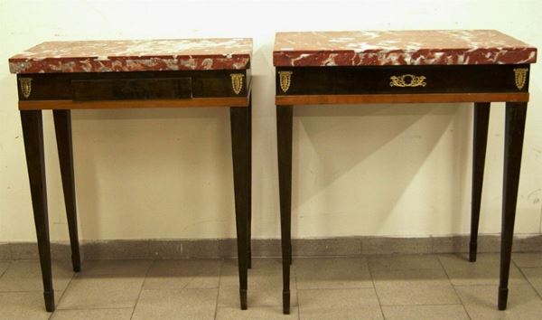 Due console, Impero, in noce, con decorazioni in bronzo dorato, una con cassetto, gambe troncopiramidali, piano in marmo rosso, cm 84x51x95 e cm 80x41x94(2)