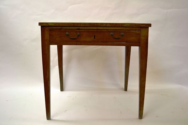 Tavolo, sec. XIX, in noce, piano rettangolare, fascia ad un cassetto, gambe troncopiramidali, cm 82x71x75, lievi danni
