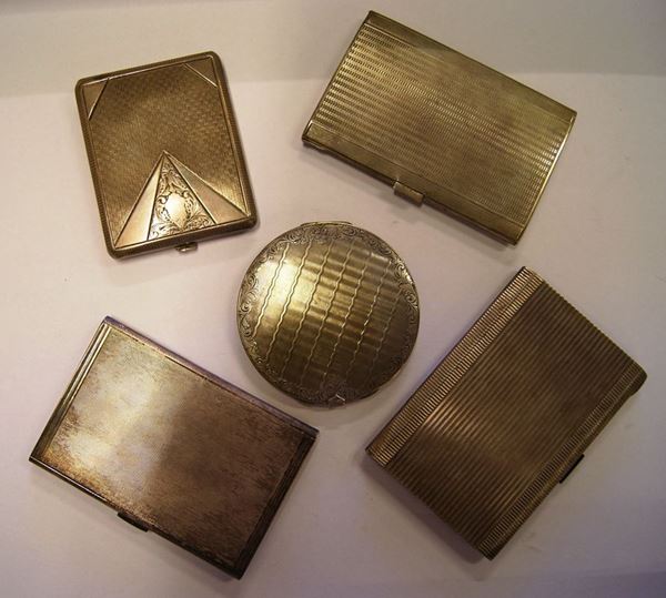 Quattro portasigarette e un portagioie, sec. XX, in argento lavorato, gr. 650(5)