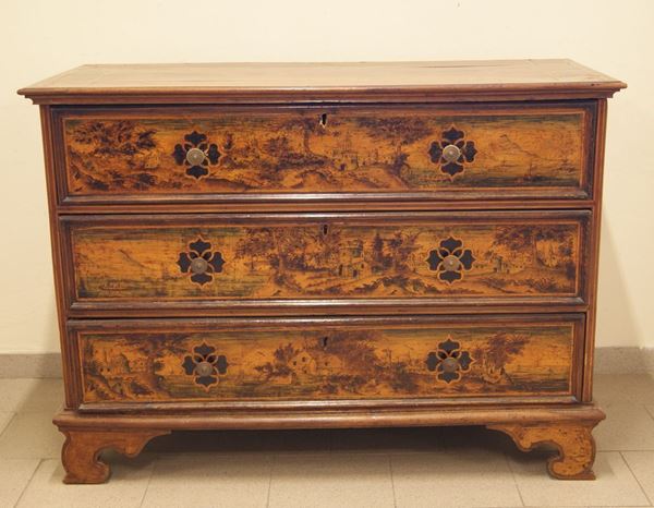 Cassettone, Veneto, sec. XVII, in noce, a tre cassetti pirografati a paesaggi, cm 175x58x98