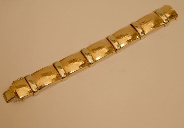 Bracciale, in oro giallo e rosso, a maglia cannettata snodata, marcato Torrini, gr. 73