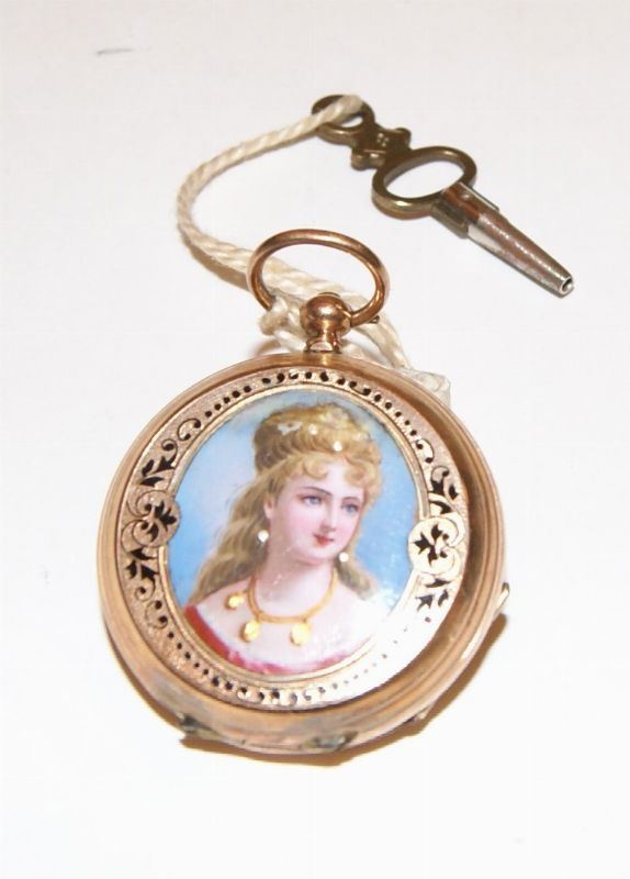 Orologio da tasca, sec. XIX, in oro 14 kt, caricamento a chiave, doppia cassa con decorazione a miniatura raffigurante BUSTO DI SIGNORA, con smalti, gr. 26