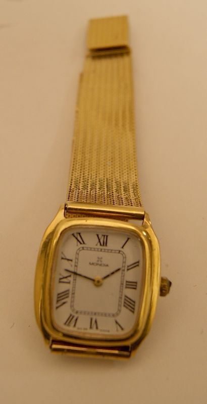 Orologio da polso Mondia, in oro giallo, con cassa e cinturino, gr. 53