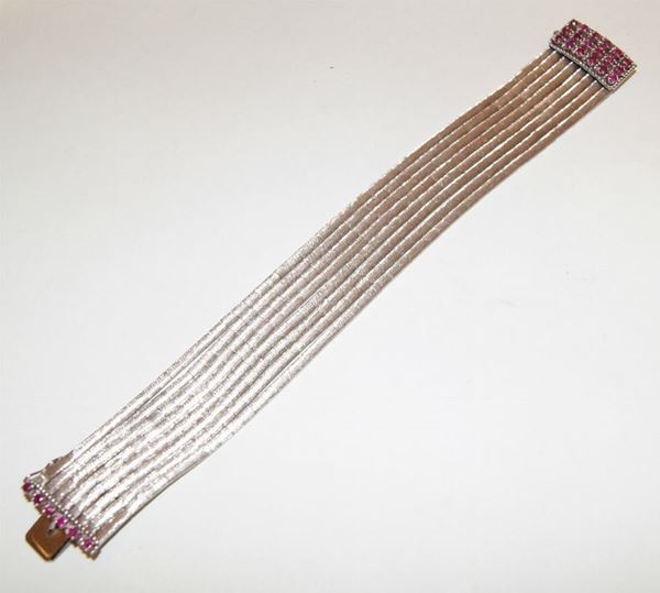 Bracciale a otto fili, in oro bianco, con quattro file di rubini, gr.60