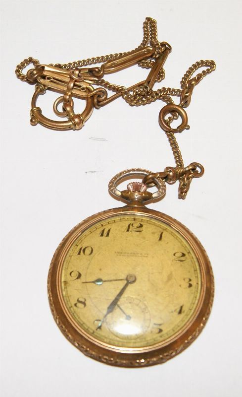 Orologio da tasca Eberhard, inizi sec. XX, in metallo dorato e catena