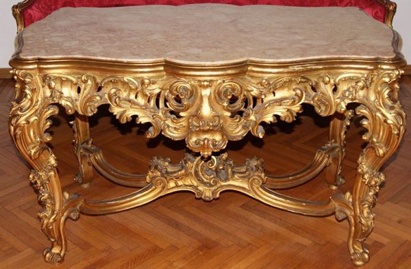 Tavolo, Italia centrale, primi sec. XX, in legno intagliato e dorato, con piano in marmo, cm 130x76x77  - Asta Antiquariato, Collezionismo & Gioielli - Poggio Bracciolini Casa d'Aste