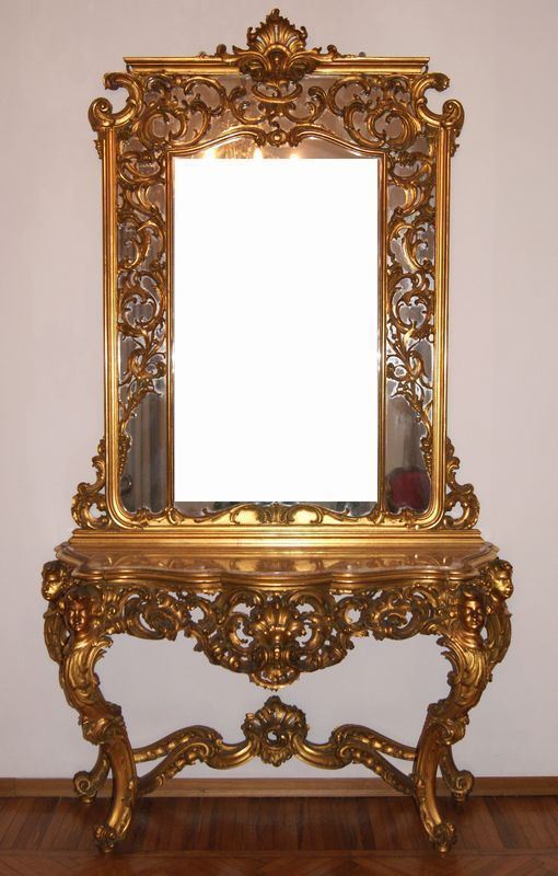 Console, Italia centrale, primi sec. XX, in legno riccamente intagliato e dorato con piano in marmo e sovrastante specchiera, cm 160x53x262