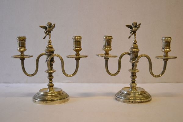 Coppia di candelabri in argento, il peso Ã¨ di g 1000 c.a.