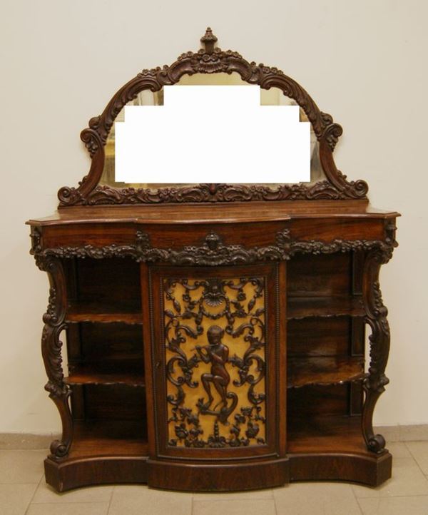 Credenza, Toscana, sec. XIX, in palissandro intagliato e sagomato, ad uno sportello decorato in legno traforato, un cassetto, laterali a vani, alzata sagomata con specchio, cm 134x42x170