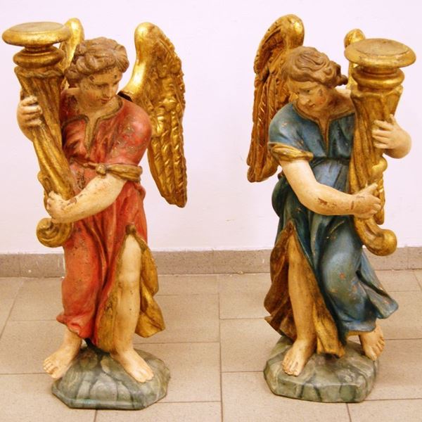 Coppia di sculture, PUTTI, in terracotta smaltata, alt. cm 90 (2)