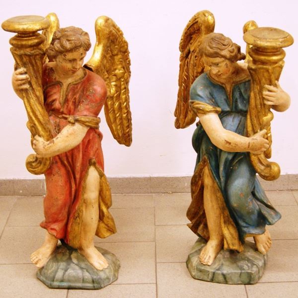 Coppia di sculture, PUTTI, in terracotta smaltata, alt. cm 90 (2)