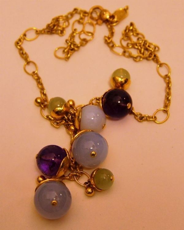 Collana in oro giallo con pendenti a sfera in ambra e ametista, marcata Torrini, peso oro gr 10,57