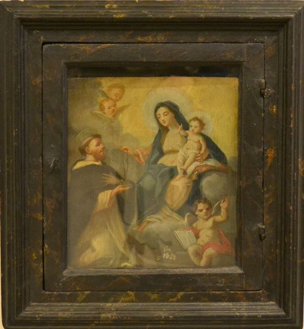 Scuola Italiana, se. XVIII  MADONNA CON BAMBINO  olio su tavola  entro cornice ad urna laccata con sportello, cm 34x29 la tavola e cm 53x50 la cornice