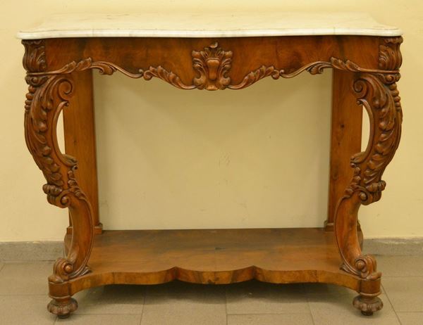 Consolle Luigi Filippo, sec. XIX, in noce sagomata e intagliata, gambe mosse, piano di marmo, cm 123x55x103