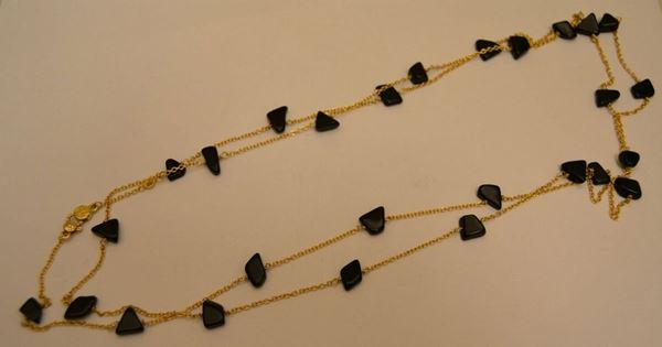 Collana in oro giallo, CHIPS, con intersezioni in onice, peso oro g 9,2, marcata Torrini