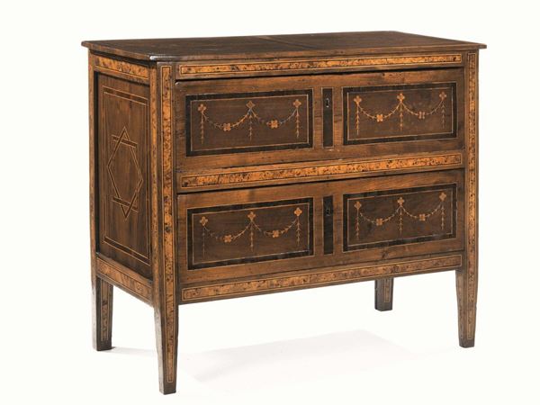Cassettone, Rolo, inizi sec. XIX, in noce intarsiato e filettato, piano     rettangolare decorato a motivi geometrici, due cassetti  con festoni        vegetali inquadrati da lesene in radica, gambe troncopiramidali, cm         106x51x90