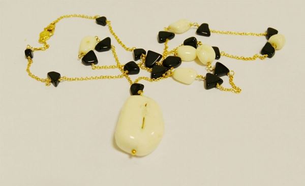 Collana in oro giallo, ZEBRA, con pietre bianche e nere, oro g 6,5, marcata Torrini