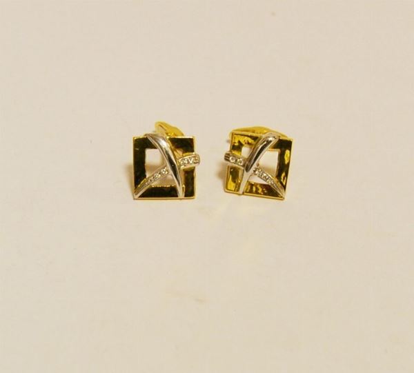 Paio di gemelli in oro giallo e rodio, LIVINGSTONE, con brillanti, g 10,5, marcati Torrini
