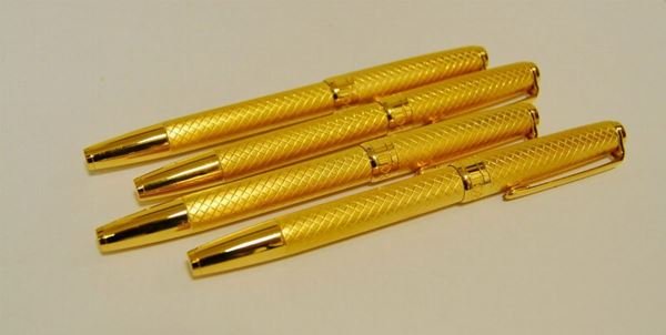 Quattro penne biro, in argento dorato, marcate Torrini (4)