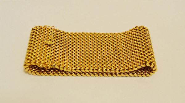 Bracciale in oro giallo a fascia larga a maglie snodabili, g 75,5