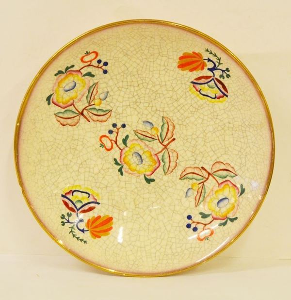 Piatto circolare, sec. XX, in ceramica decorata a fiori, manifattura LENCI, diam. cm 30,5
