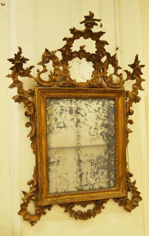 Specchiera, Marche, sec. XVIII, in cornice intagliata e dorata, con fregi di epoca posteriore, cm 126x92