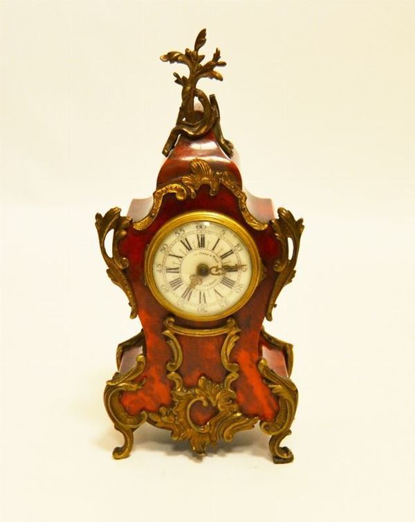 Orologio da tavolo con rapporti in metallo, alt. cm 25