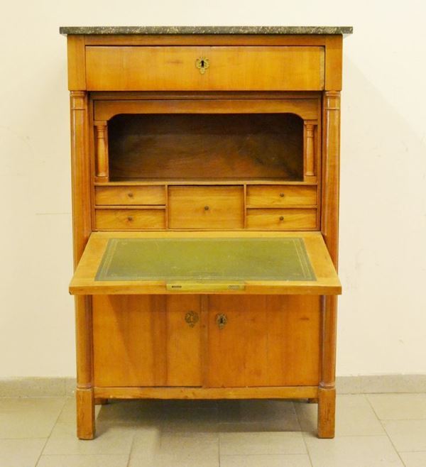 Secretaire, Italia settentrionale sec. XIX, in ciliegio, con cassetto e tre sportelli di cui uno a ribalta, scarabattolo con cassettini e vani a giorno, piano in marmo, cm 96x45x142, mancanze