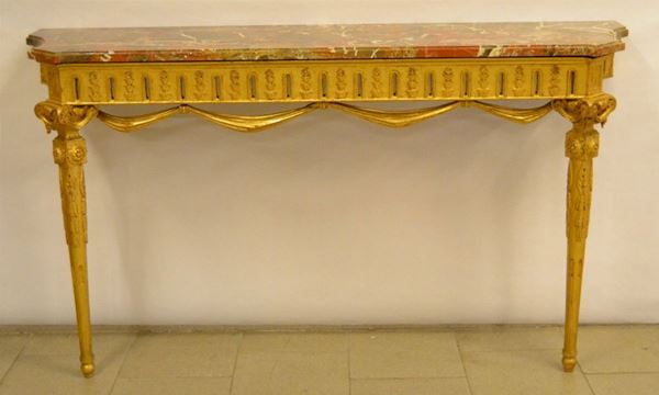 Consolle, stile Luigi XVI, in legno intagliato e dorato, piano in breccia di marmo rosa, pendaglina intagliata a festone, gambe scanalate, cm 140x41x87