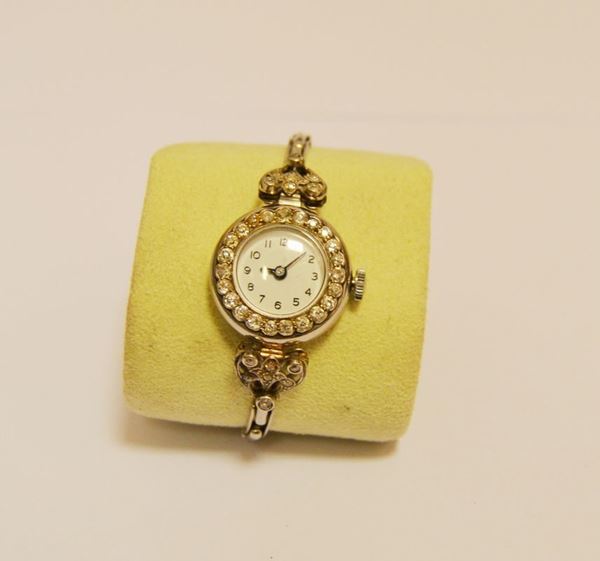 Orologio da polso per signora con cassa e bracciale in oro bianco a molla , decorata  con brillanti g 21