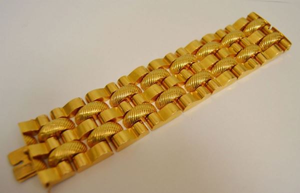 Bracciale in oro giallo a fascia larga con maglie snodate g 128,5  - Asta Arredi, oggetti d'arte, dipinti - Poggio Bracciolini Casa d'Aste